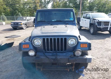 2001 Jeep Wrangler Sport z USA, uszkodzony, nr VIN 1J4FA49S01P329609